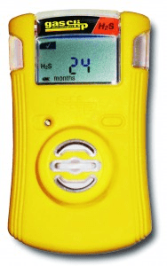 A yellow device with a digital display.