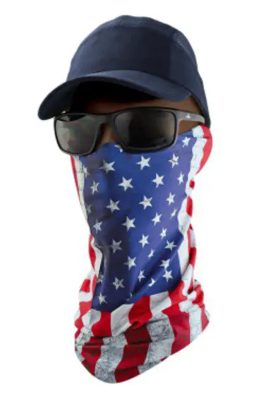 A man wearing sunglasses and an american flag mask.