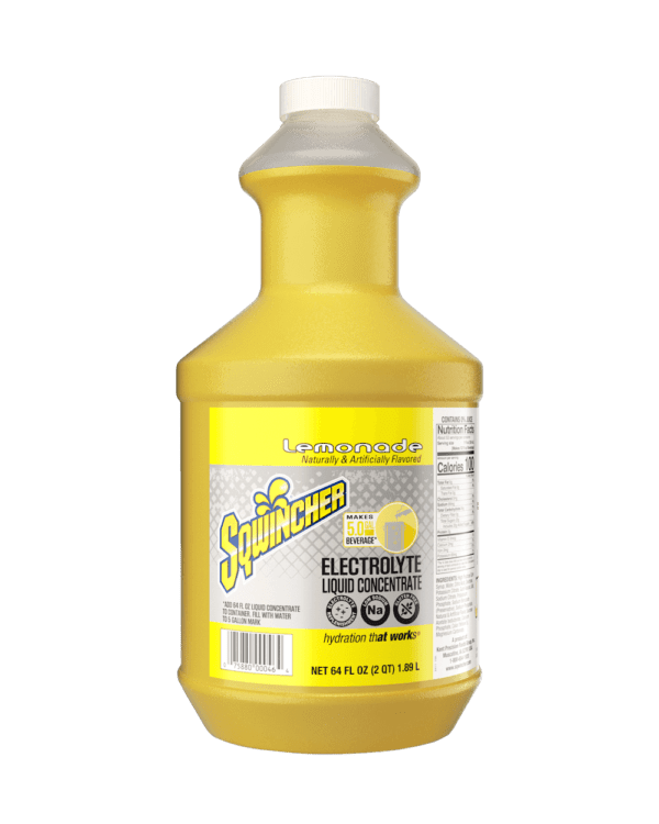 A bottle of yellow liquid on a green background